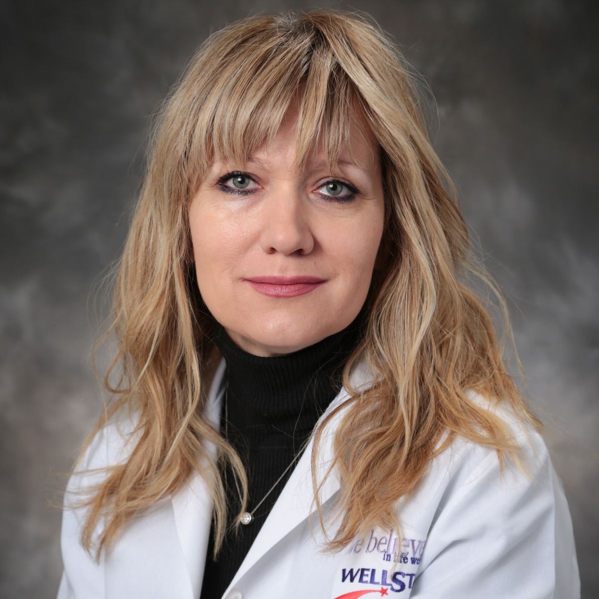 A friendly headshot of Zhaneta Dzmitryieva, MD