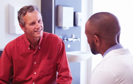 Healthcare provider and patient having a discussion